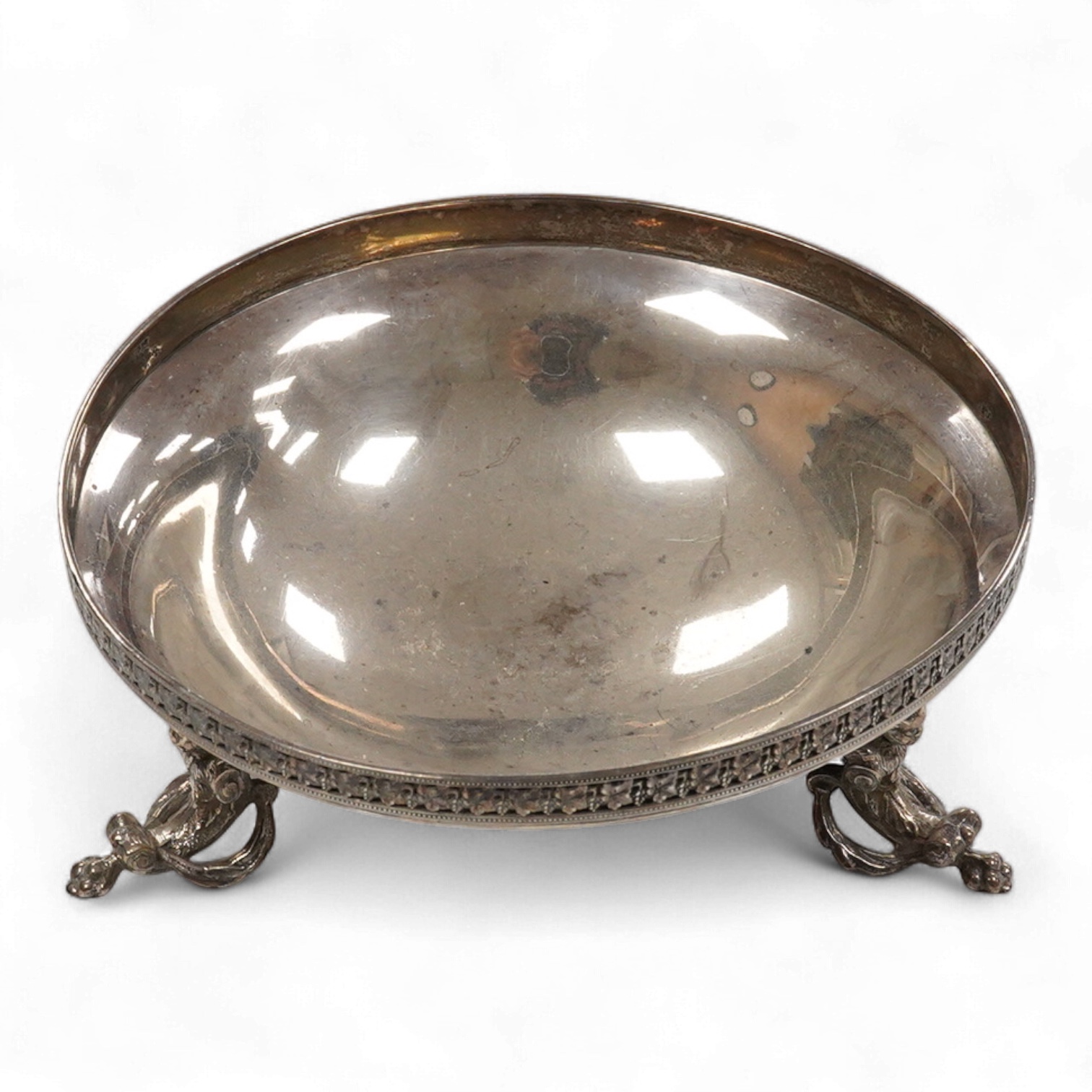 A George V silver bowl, on three figural supports, by Mappin & Webb, London, 1921, diameter 15cm, 7.5oz.